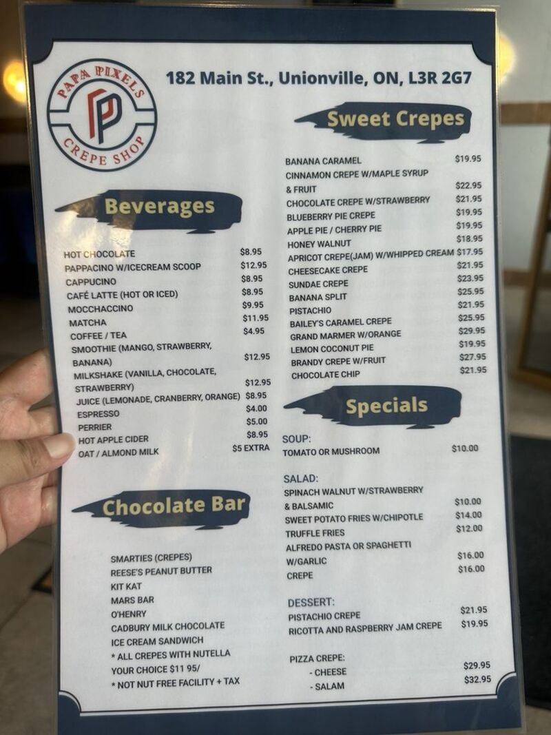 Printed dine-in menu listing beverages, sweet crêpes, the chocolate bar and specials